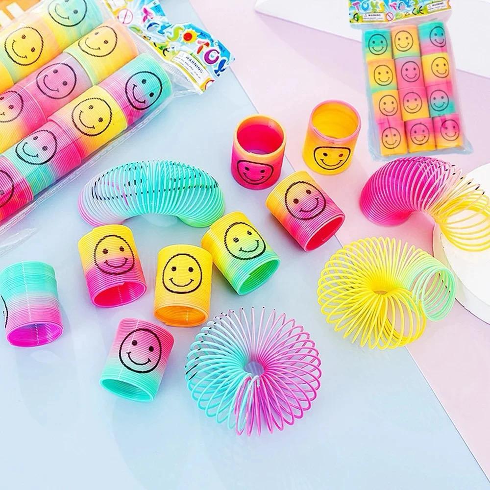 Pack Of 2 - Mini Smiling Face Rainbow Circle Spring Toy