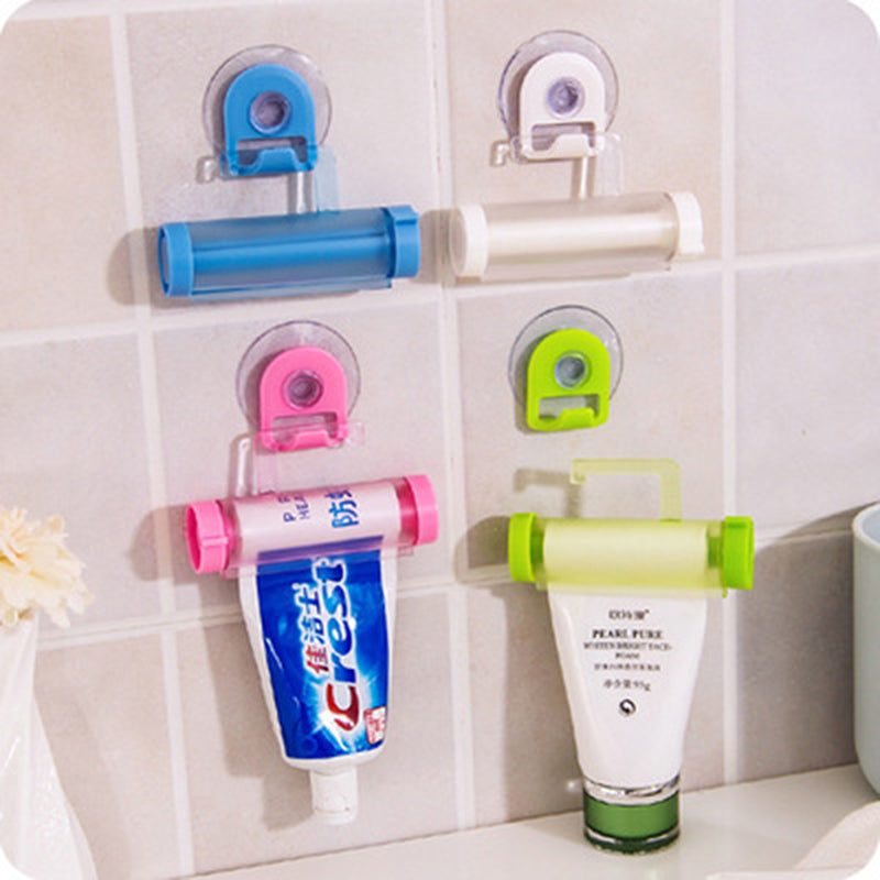 Multifunctional Hanging Type Roll Squeezing Toothpaste Dispenser.