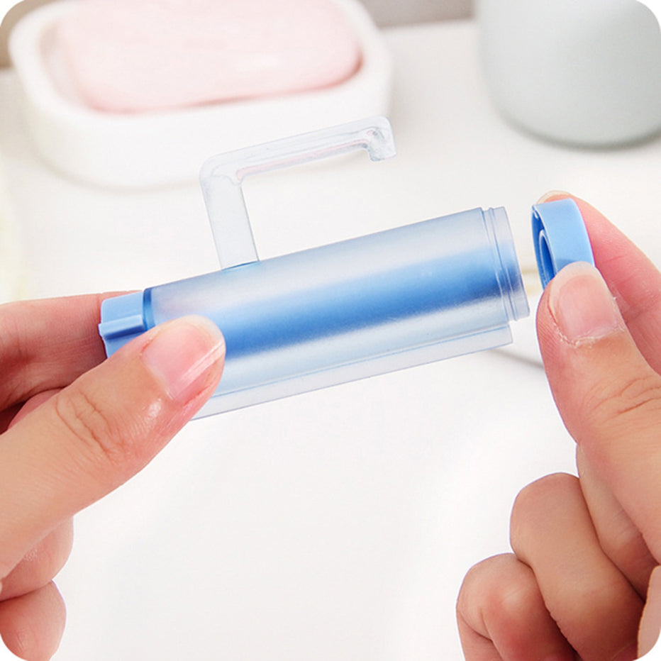 Multifunctional Hanging Type Roll Squeezing Toothpaste Dispenser.